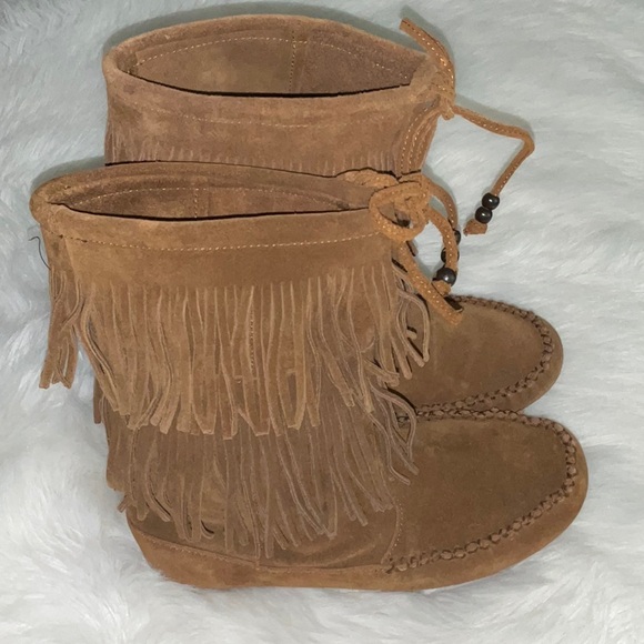 Minnetonka Double Fringe
Moccasin Boots - Picture 2 of 11